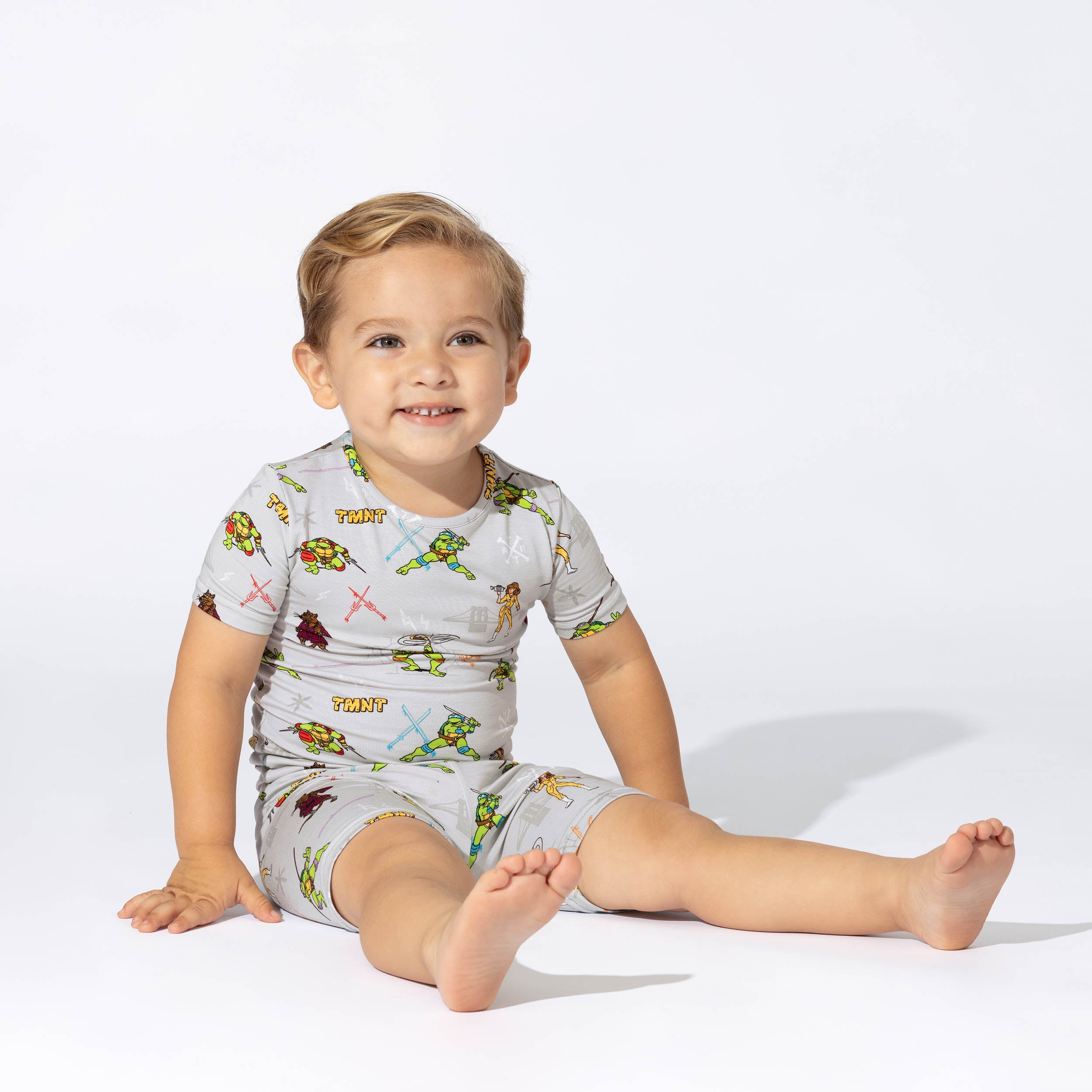 http://bellabubear.com/cdn/shop/files/shopifyteenagemutantninjaturtlesretrokidsshortsetpajamas.jpg?v=1695251321